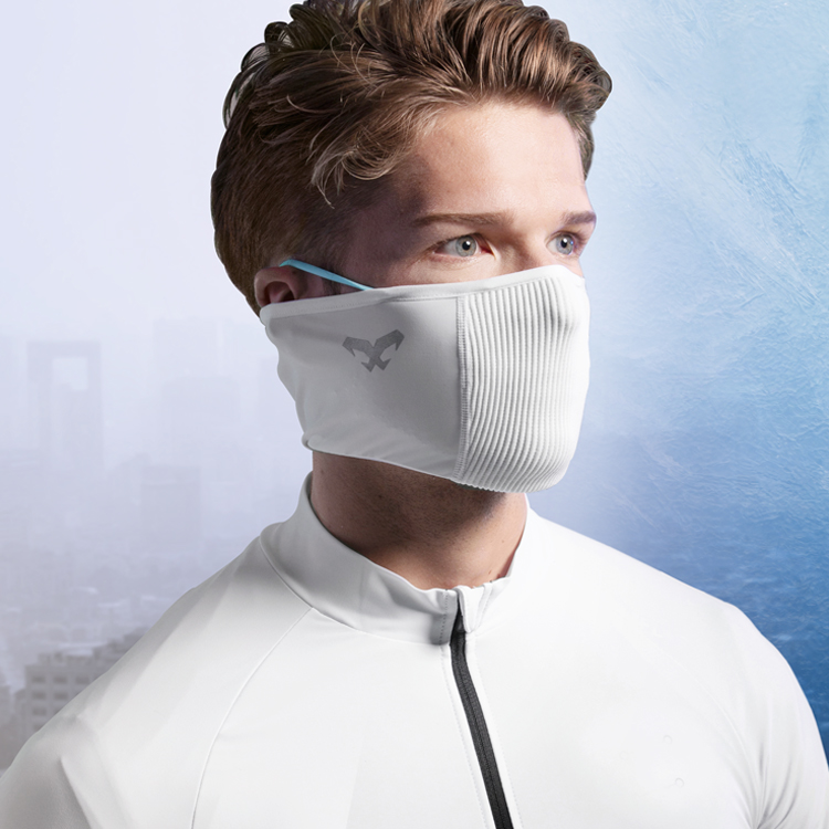 NAROO F1S white face cover worn with a cycling jersey.