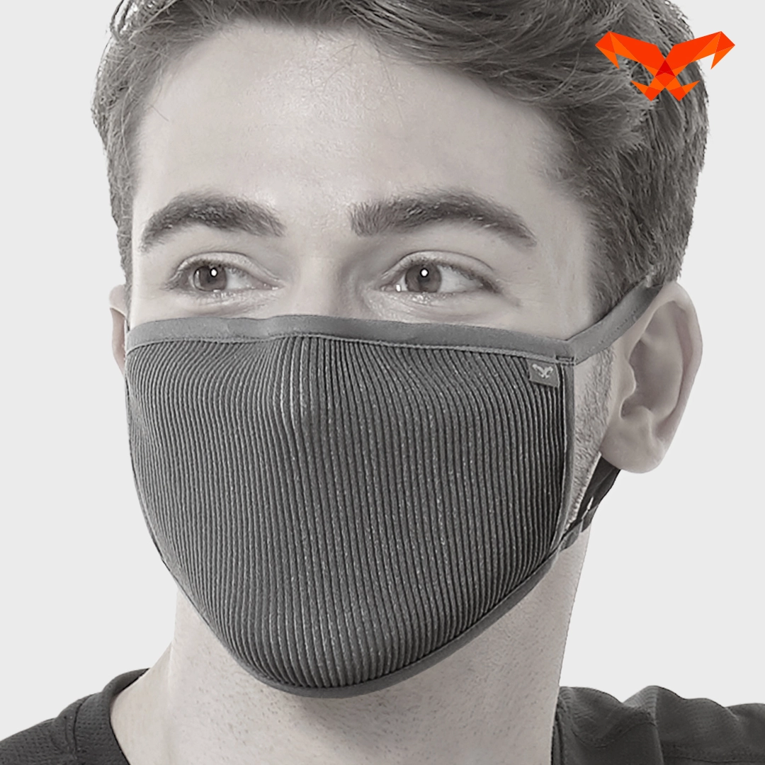 NAROO F.U+ gray face mask worn by a model, showing the front and ear loops.
