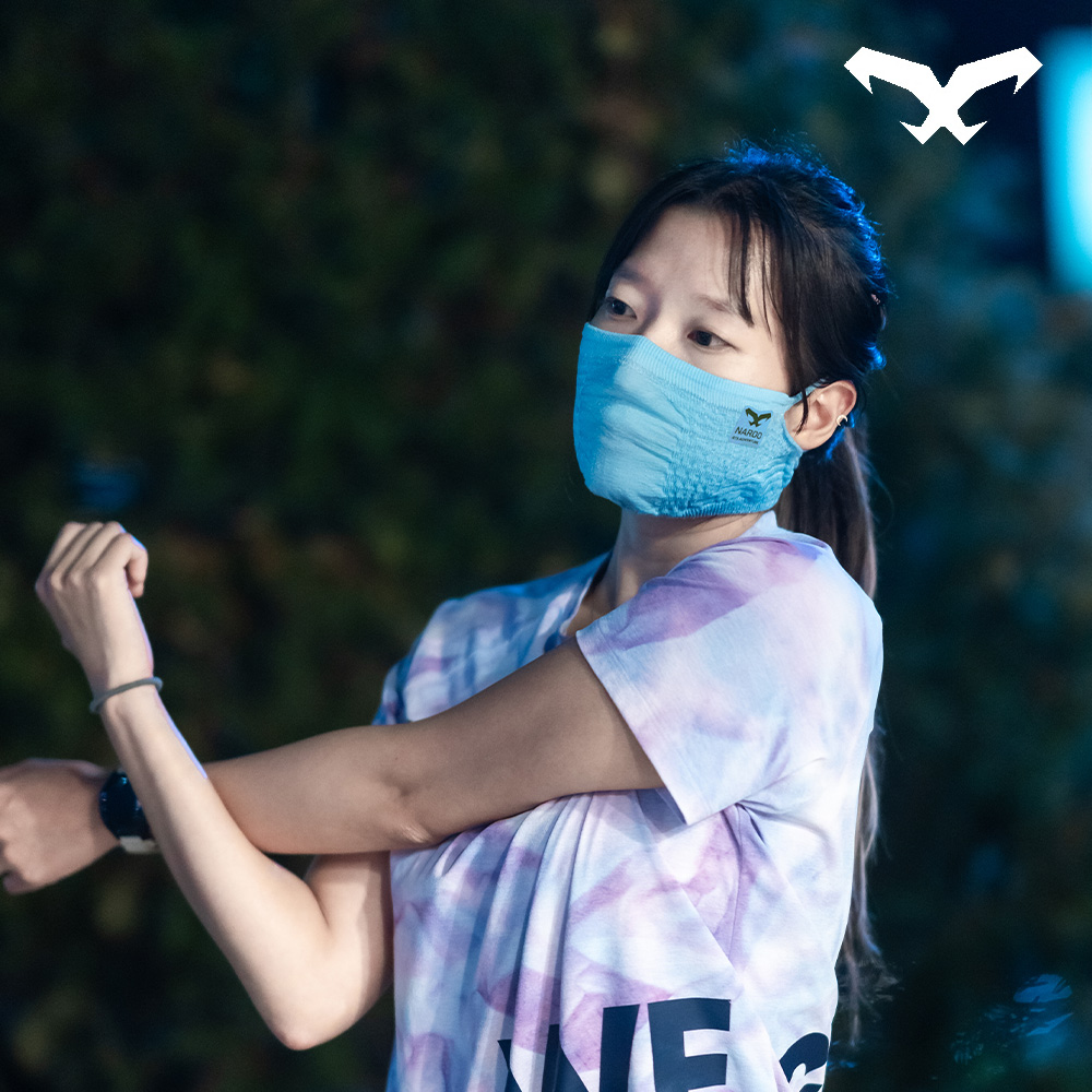 NAROO A1S blue face cover worn by a woman outdoors