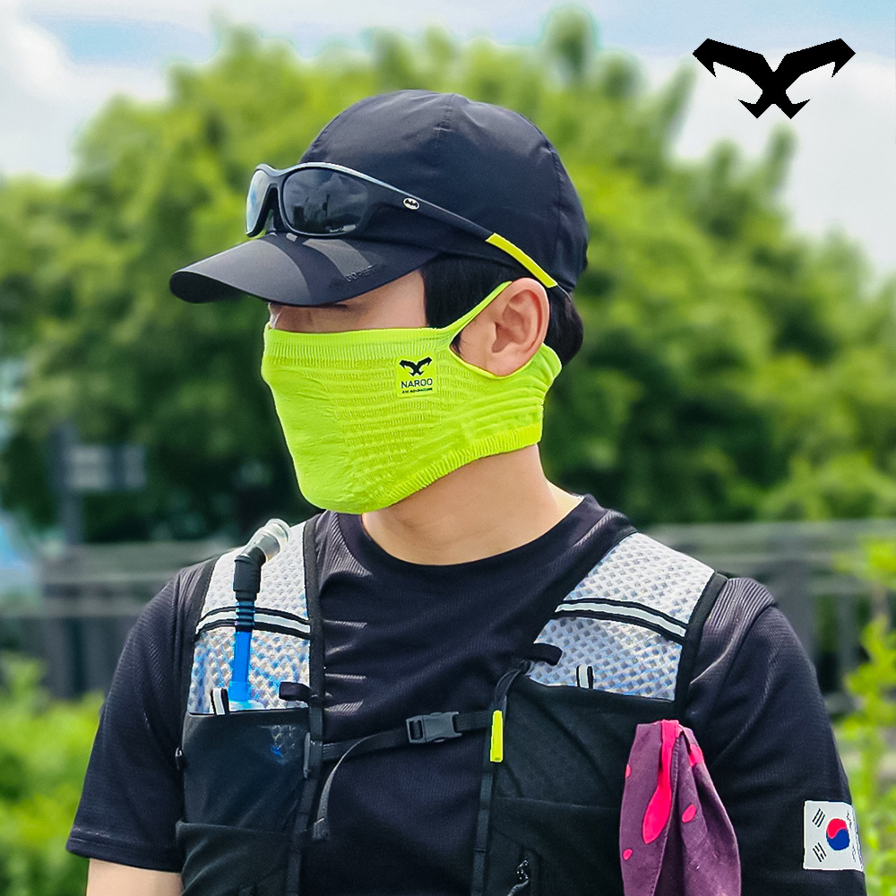 NAROO A1S lime face cover worn by a man outdoors