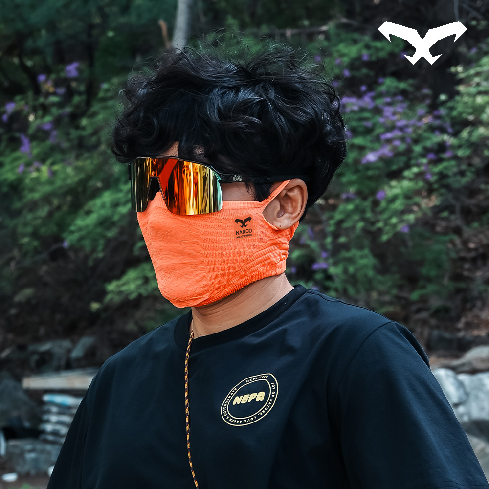 NAROO A1S orange face cover worn by a man outdoors