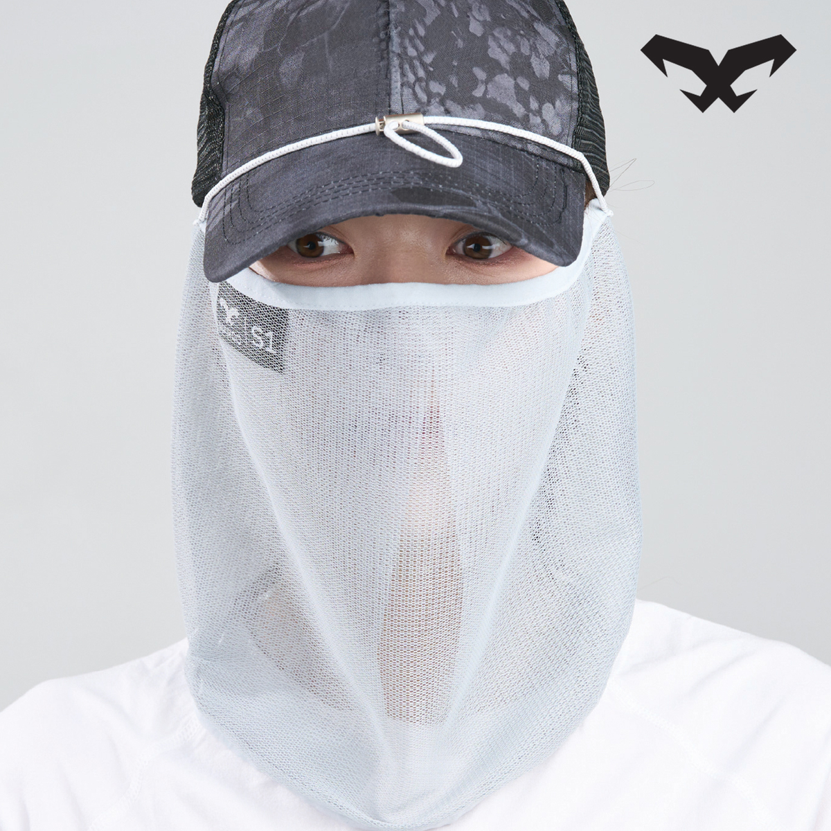 NAROO S1 light gray sun cover worn with a cap, front view