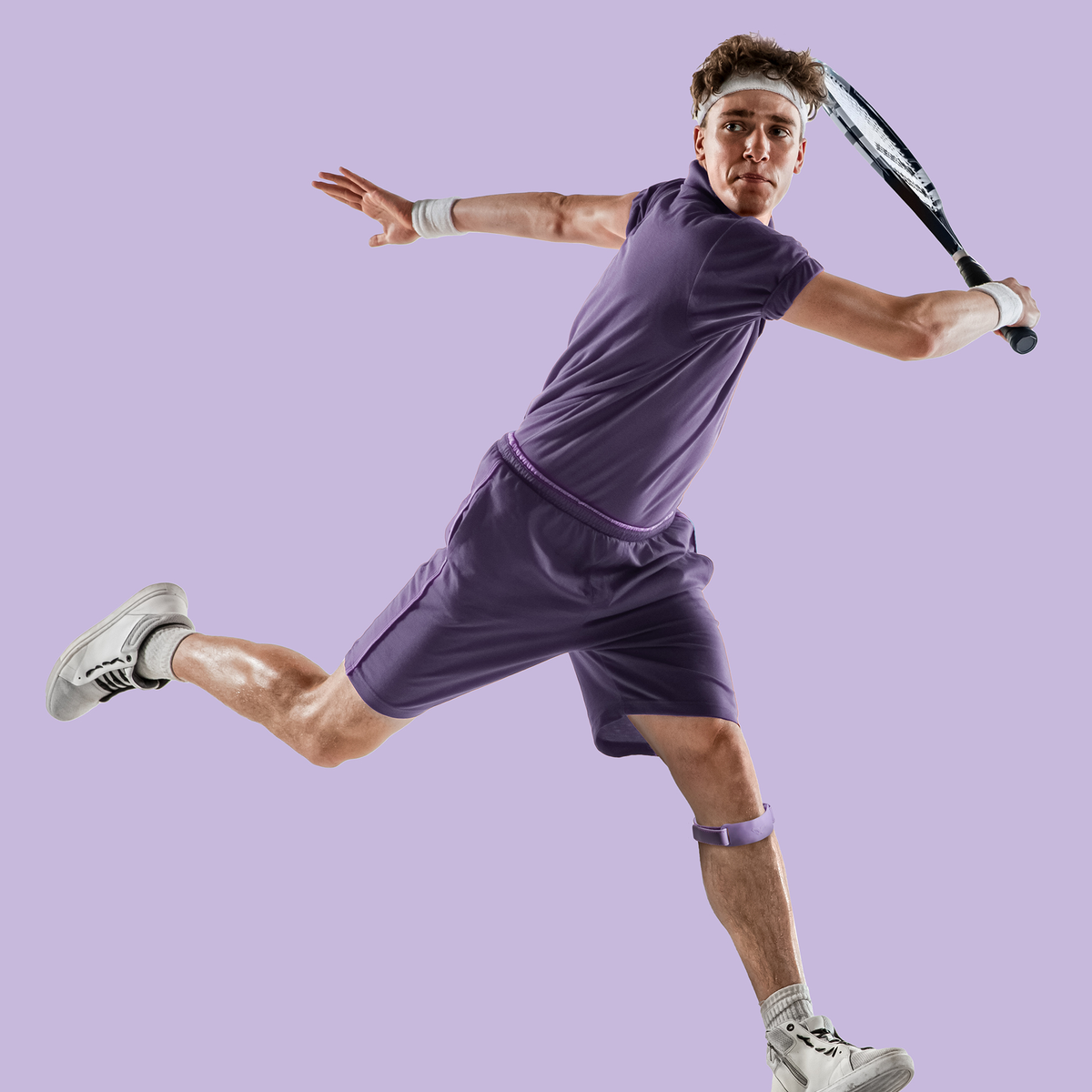 NAROO SK1 purple strap worn during a racket sport