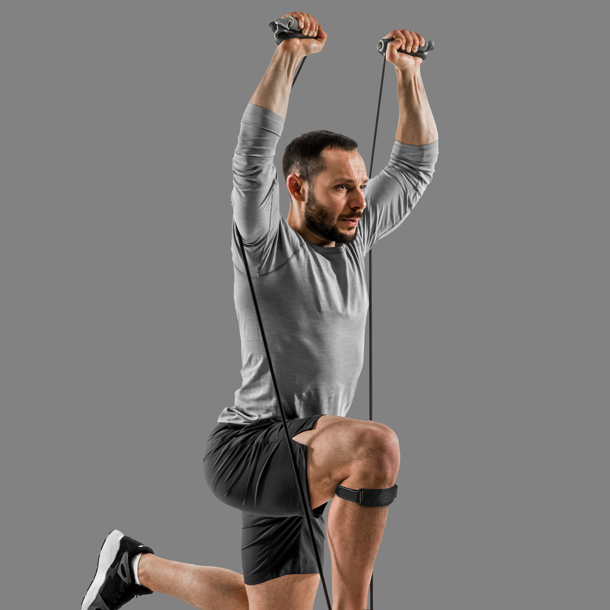 NAROO SK1 strap worn on the knee during an outdoor workout