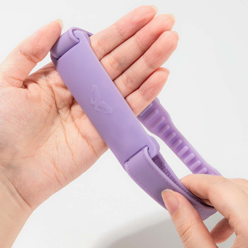 NAROO SK1 purple strap held in a hand to show the loop closure